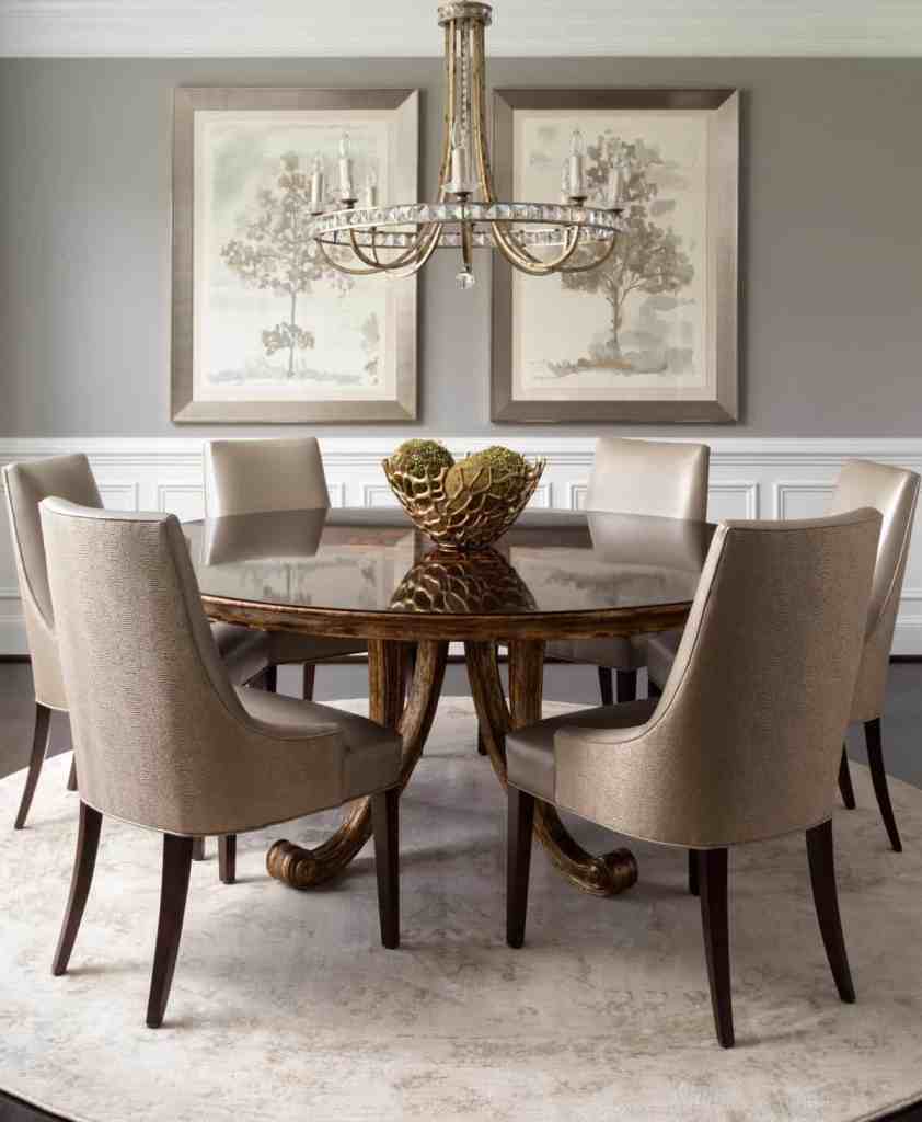 n heirloom round table anchors the space, echoed by a round rug that lets its shape shine.