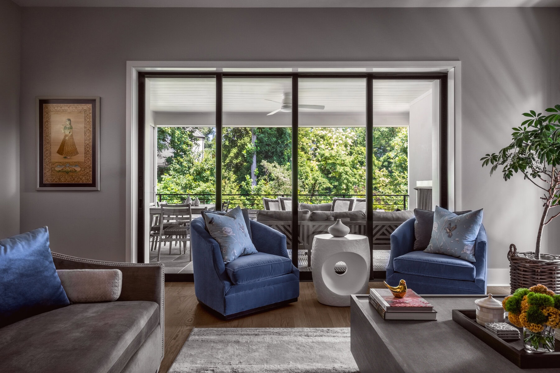 Calm blues and neutrals keep the space feeling collected and serene.